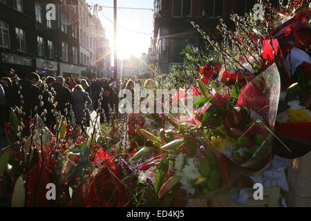 Image of flower stalls on Grafton Street in Dublin city centre as trade booms in the run up to Christmas. Stock Photo