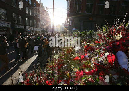 Image of flower stalls on Grafton Street in Dublin city centre as trade booms in the run up to Christmas. Stock Photo