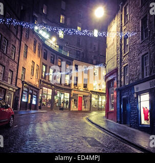 Looking up Edinburgh's Historic Victoria St, City Centre, Lothian, Scotland, UK at night Stock Photo