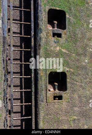 Wet ladder and slimy surface of the canal lock on Rhine Main Danube canal in Germany, Europe Stock Photo