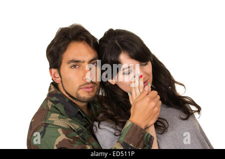 young woman and soldier in military uniform say goodbye deployment Stock Photo