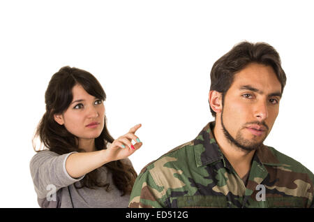 young woman and soldier in military uniform say goodbye deployment Stock Photo