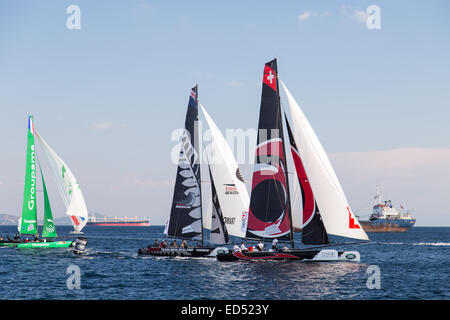 ISTANBUL, TURKEY - SEPTEMBER 13, 2014: Alinghi, Emirates Team New Zealand and Groupama teams compete in Extreme Sailing Series. Stock Photo