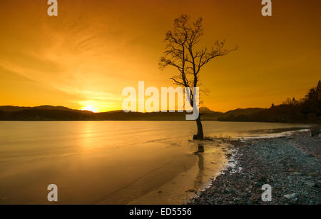 Loch Ard in the Loch Lomond and Trossachs National Park with a stunning sunset. Stock Photo