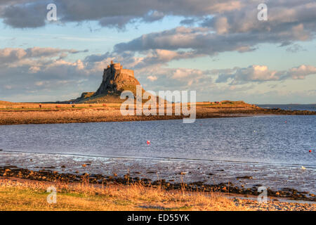The iconic view on Lindisfarne, Northumberland looking towards the castle Stock Photo