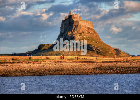 The iconic view on Lindisfarne, Northumberland looking towards the castle Stock Photo