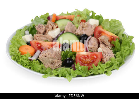 Tuna salad with tomatoes, carrots, feta cheese and olives in bowl Stock Photo
