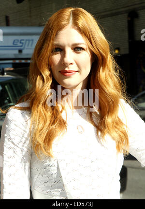 Celebrities pose for photographers outside The Ed Sullivan Theater, as