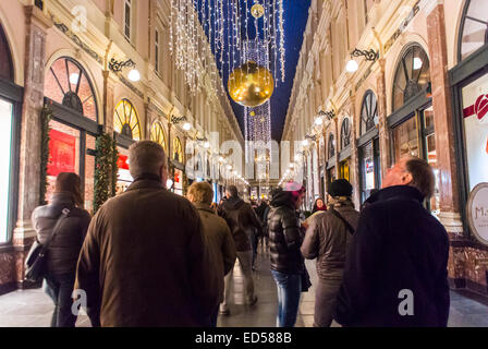 Brussels, Belgium, inside old Shopping Mall in Center City, Crowd of people Walking on Street, Enjoying Christmas Lights, Decorations Stock Photo