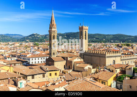 Tower and Badia  over the rooftops of Florence, Italy Stock Photo