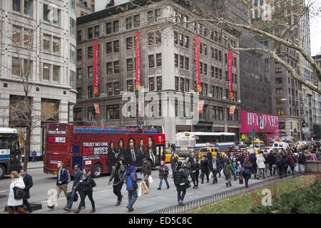 People walk on 5th Avenue near 42nd St.by the New York Public Library. Stock Photo