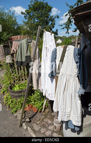 Period Victorian costumes on washing line, Blists Hill Victorian town, Ironbridge, Shropshire, England, UK Stock Photo