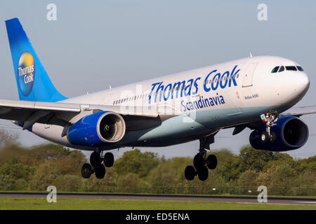 Thomas Cook Scandinavia Airbus A330-200 approaches runway 05R at Manchester airport. Stock Photo