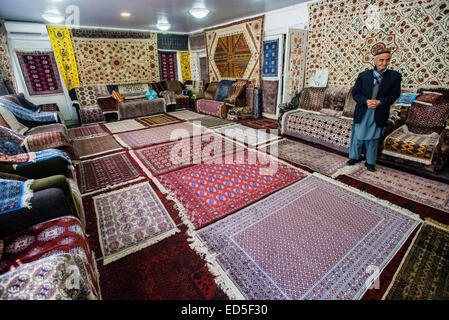 Carpets shop-gallery at the Samarkand-Bukhara Silk Carpets workshop, Samarkand, Uzbekistan Stock Photo