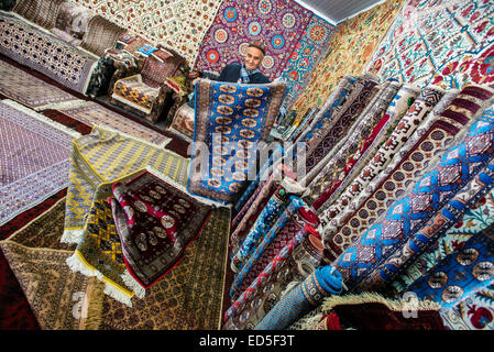 Carpets shop-gallery at the Samarkand-Bukhara Silk Carpets workshop, Samarkand, Uzbekistan Stock Photo