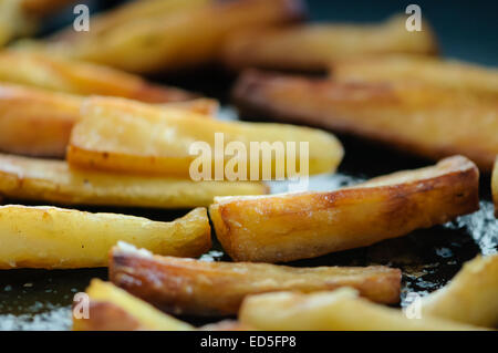 Parsnips roasted in goose fat Stock Photo