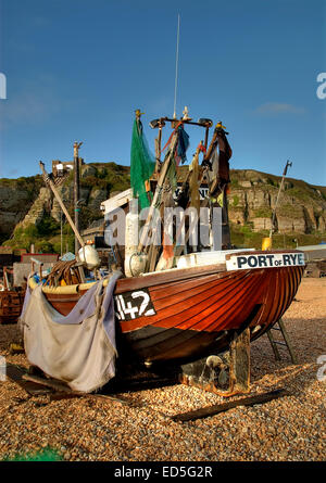 Hastings is the place to be if you want to photograph fihing boats on the beach, as in this case with the boat Port Of Rye. Hast Stock Photo