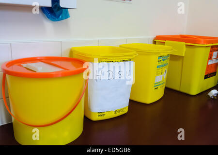 Sharps and medical waste disposal containers. Stock Photo