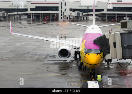 airplane Nok Air parked in the airport Don Muang Stock Photo