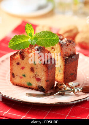 Two pieces of fruit cake on plate Stock Photo