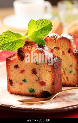 Two pieces of fruit cake on plate Stock Photo