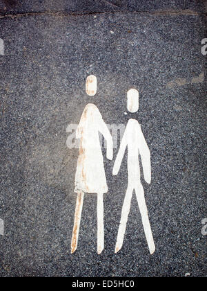 Pedestrian sign painted on a pavement Stock Photo