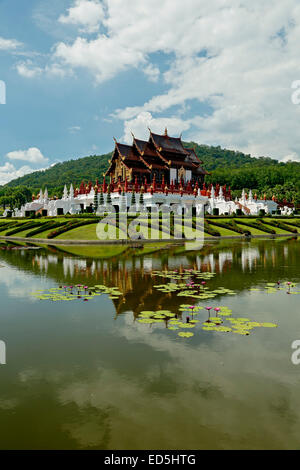 Royal Pavilion reflected on pond with lily pads, Royal Park Rajapruek, Chiang Mai, Thailand Stock Photo