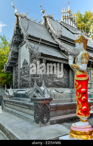 Statue of Buddha and Wat Sri Suphan (Silver Temple), Chiang Mai, Thailand Stock Photo