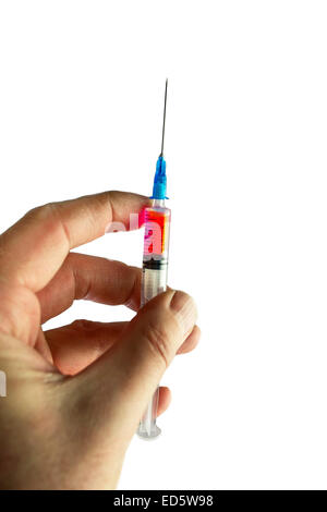Hand Holding Syringe Stock Photo