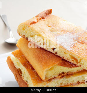 some pieces of coca de sucre, a typical sweet flat cake from Catalonia, Spain Stock Photo