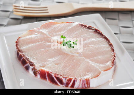 closeup of a slice of blue shark in a plate ready to be cooked Stock Photo