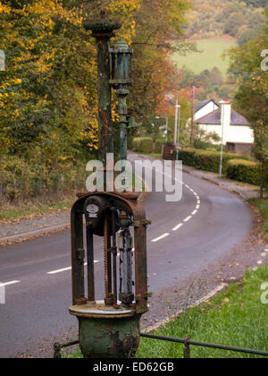 disused and derelict old petrol pump equipment,by the roadside near Brecon,South Wales Stock Photo