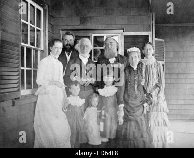 Mabel Hubbard Bell, Alexander Graham Bell, Dr. Bartol, Alexander Melville Bell, Eliza Grace Symonds, and Mary True with children, Daisy Bell, Gypsy Grossman, and Elsie Bell at the Hubbard home in Manchester, Mass., c1885, photographic print Stock Photo