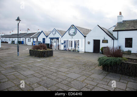 Harbour Harbor square Oyster Brewery bar and restaurant and workmans' cottages at Ellenabeich on the Isle of Seil near Oban Scot Stock Photo