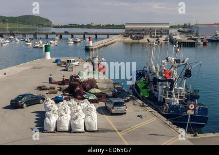 Fishing port of Santoña, Cantabria, Spain, women who repair fishing nets Stock Photo