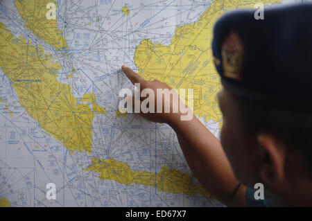 Surabaya, East Java, Indonesia. 29th Dec, 2014. SURABAYA, INDONESIA - DECEMBER 29: An Indonesia Air Force show map to the search and rescue for missing of AirAsia flight QZ8501 at Juanda Airport on December 29, 2014 in Surabaya, East Java, Indonesia. Indonesia Navy deployed 10 warship, 4 planes and one helicopter to search victim of AirAsia flight QZ8501, Malaysia Navy and Singapore Navy, Australian Navy, South Korea Navy join on search and rescue AirAsia QZ8501. © Sijori Images/ZUMA Wire/Alamy Live News Stock Photo