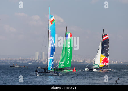 ISTANBUL, TURKEY - SEPTEMBER 14, 2014: Groupama, Red Bull Sailing and The Wave, Muscat Teams compete in Extreme Sailing Series. Stock Photo