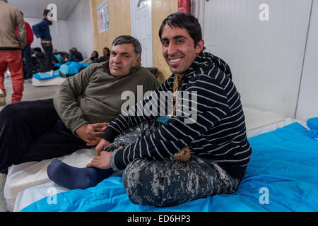 Migrants bed down for the night at a warehouse in Calais, northern France, which provides mattresses and bedding for people sleeping rough in the town as winter temperatures drop. 27th Dec, 2014. © Velar Grant/ZUMA Wire/ZUMAPRESS.com/Alamy Live News Stock Photo