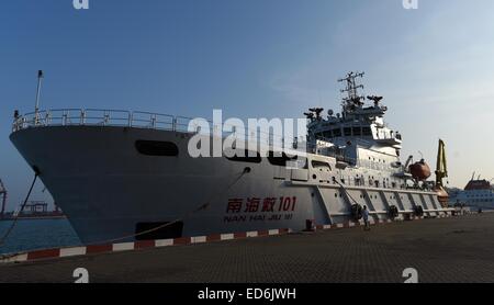 Haikou. 29th Dec, 2014. Photo taken on Dec. 30, 2014 shows Chinese rescue vessel Nanhaijiu 101 berthed in a port of Haikou, capital of south China's Hainan Province. China announced on Dec. 29, 2014 that it will send aircraft and vessel to join the search and rescue work for missing AirAsia flight QZ8501. By far, a navy frigate on routine patrol in the South China Sea is heading for the waters where the jet went missing. Besides, Chinese patrol ship Haixun 31, rescue vessel Nanhaijiu 101 and Nanhaijiu 115 are also standing by. © Zhao Yingquan/Xinhua/Alamy Live News Stock Photo