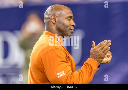 Texas head coach Charlie Strong walks the sidelines during the first ...