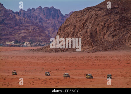 Exploring with a four wheel drive the Wadi rum desert in Jordan Stock Photo