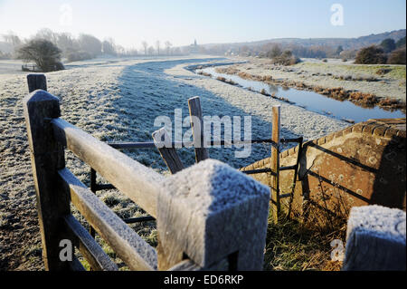 Alfriston Sussex UK. 30th December 2014. UK weather. The frosty scene along the River Cuckmere in East Sussex as temperatures remain well below zero this morning. Stock Photo