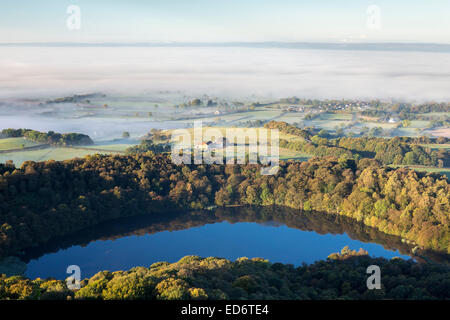 View from above Gormire lake across the Vale of York, North Yorkshire. Stock Photo