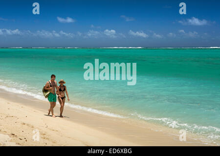 Mauritius, Le M orne, Le Morne beach, woman young couple walking along shoreline Stock Photo