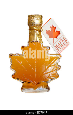 canadian maple syrup in leaf shaped glass bottle isolated on white background Stock Photo