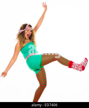 Office Party Animals: A young woman girl enjoying herself dancing wildly at  a Christmas Xmas theme fancy dress 'office party' christmas party, UK Stock Photo