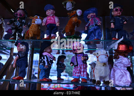 Cairo, Egypt. 29th Dec, 2014. Doll toys are displayed at a shop in preparation to celebrate the birthday of prophet Muhammad, also known as ''Mawlid Nabawi'', which will fall next week, in Cairo, December 31, 2014 © Amr Sayed/APA Images/ZUMA Wire/Alamy Live News Stock Photo