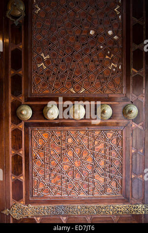 Ornate wooden carved entrance door at the Blue Mosque, Sultanahmet Camii or Sultan Ahmed Mosque, Istanbul, Turkey Stock Photo
