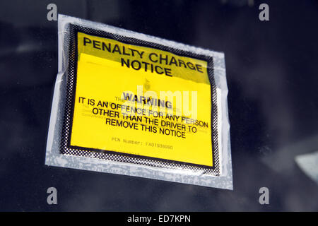 Penalty Charge Notice fixed to car windscreen. Stock Photo