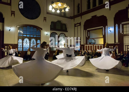 Tourists at Whirling Dervish ayin music performance - Mevlevi Sema - ceremony (whirling dervishes), Istanbul, Republic of Turkey Stock Photo